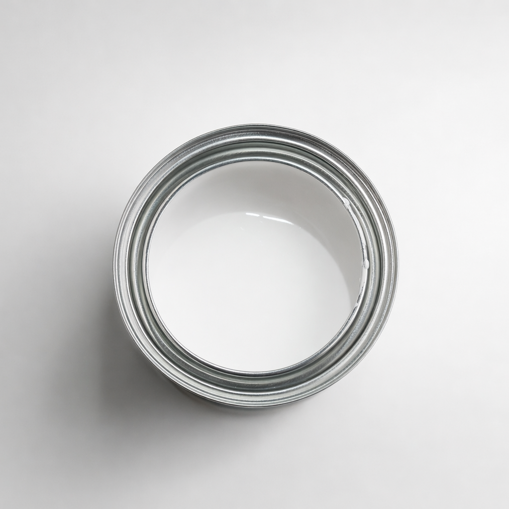 Empty paint can on a light gray background
