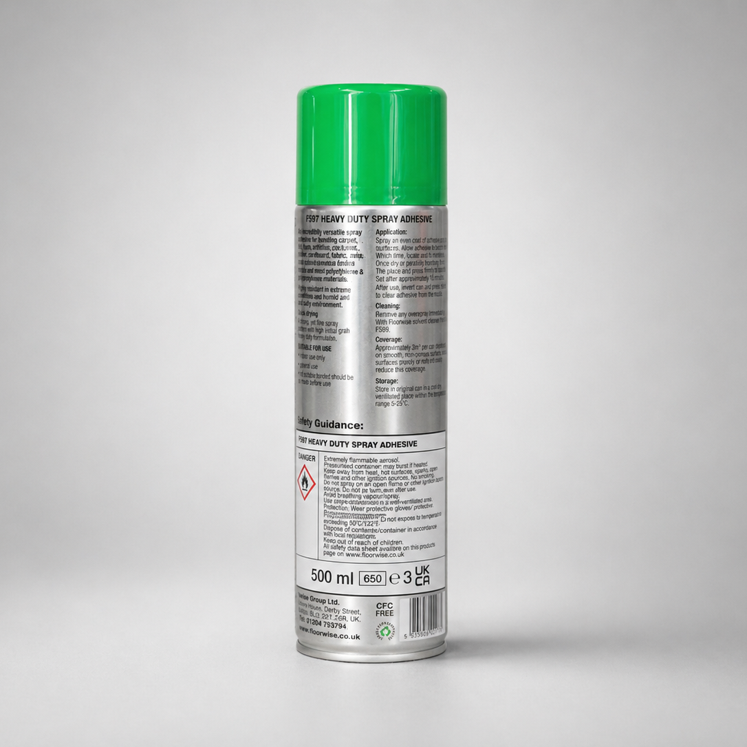 Spray can with green lid on a gray background